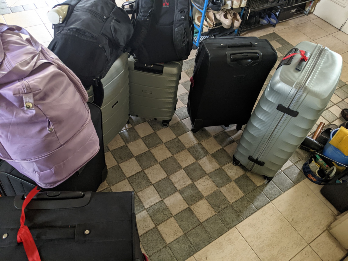 Moving house with suitcases