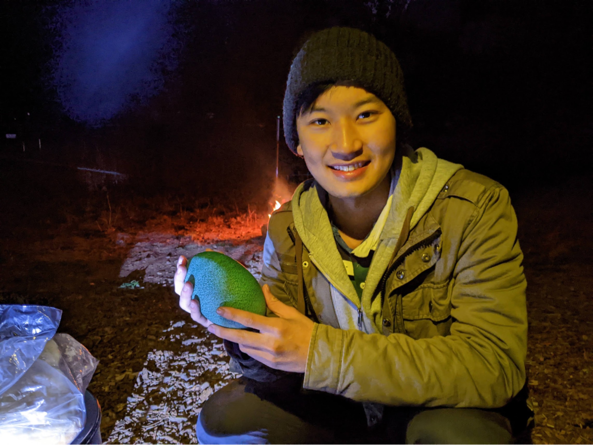 Simon trying an emu egg